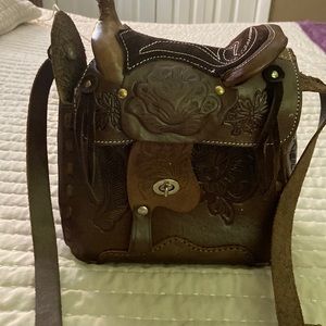 Leather saddle purse never used